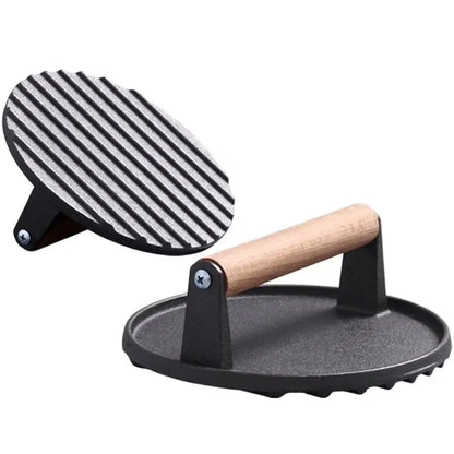 Black and light brown cast iron burger press kitchen meat tool