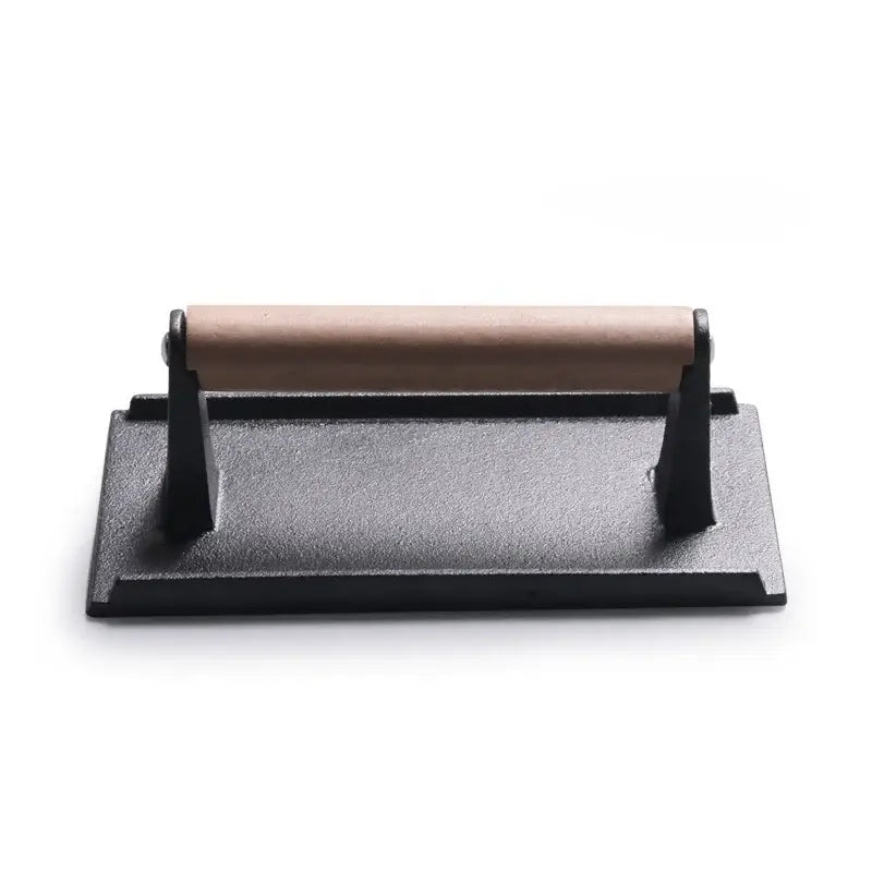 Black and light brown cast iron burger press kitchen meat tool