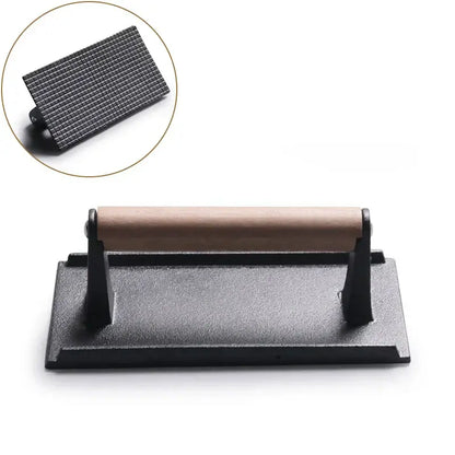 Black and light brown cast iron burger press kitchen meat tool