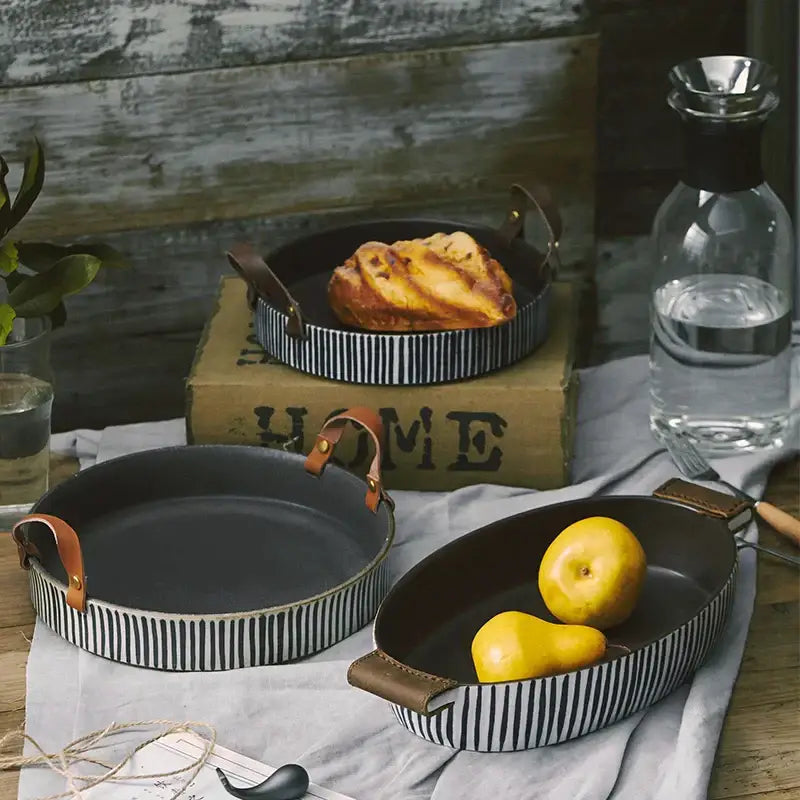 Black and white striped porcelain bowl with leather handle dining room