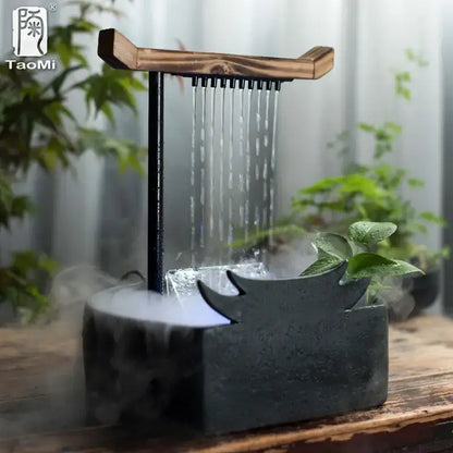 Black ceramic water fountain with wood roof living room decor