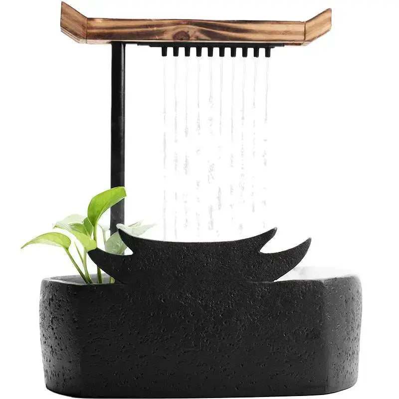 Black ceramic water fountain with wood roof living room decor