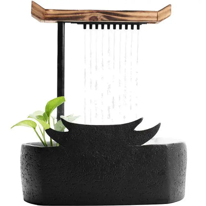 Black ceramic water fountain with wood roof living room decor