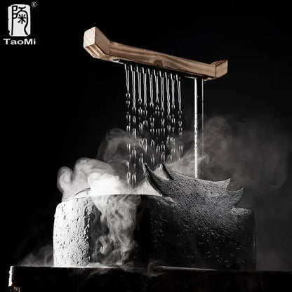 Black ceramic water fountain with wood roof living room decor