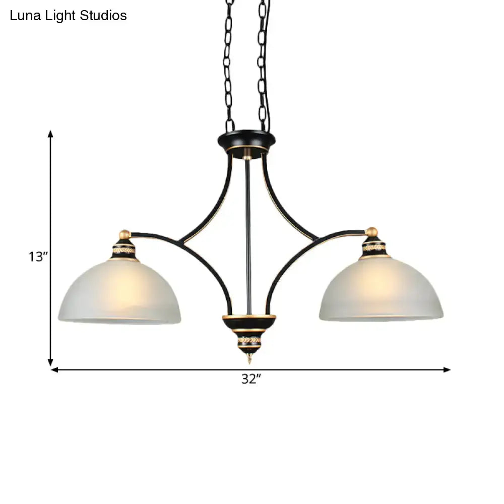 Black and gold dome chandelier with white glass shades dining room