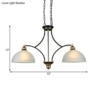 Black and gold dome chandelier with white glass shades dining room