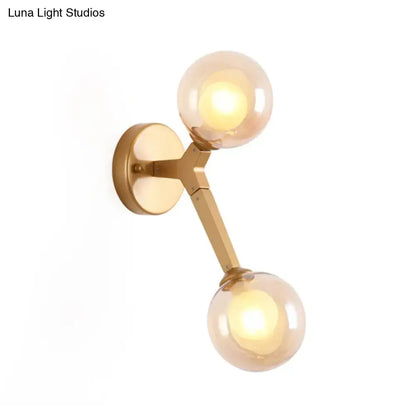 Black & gold bubble wall sconce – bedroom glass globe light