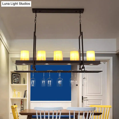 Traditional black island light fixture with wine glass holders kitchen