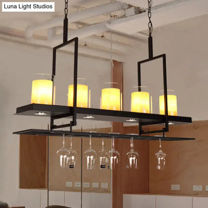 Traditional black island light fixture with wine glass holders kitchen