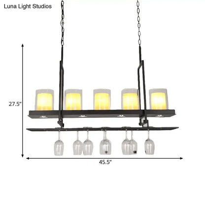 Traditional black island light fixture with wine glass holders kitchen