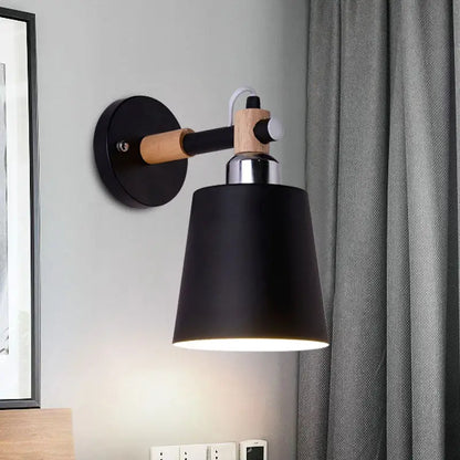 Black matte wall lamp with empire shade and wood arm for stairs