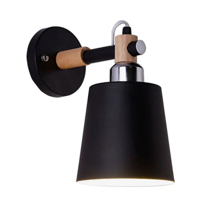 Black matte wall lamp with empire shade and wood arm for stairs