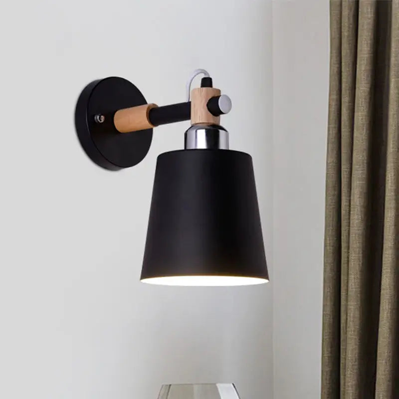 Black matte wall lamp with empire shade and wood arm for stairs