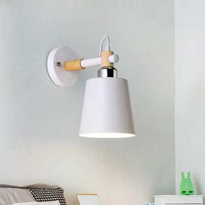 Black matte wall lamp with empire shade and wood arm for stairs