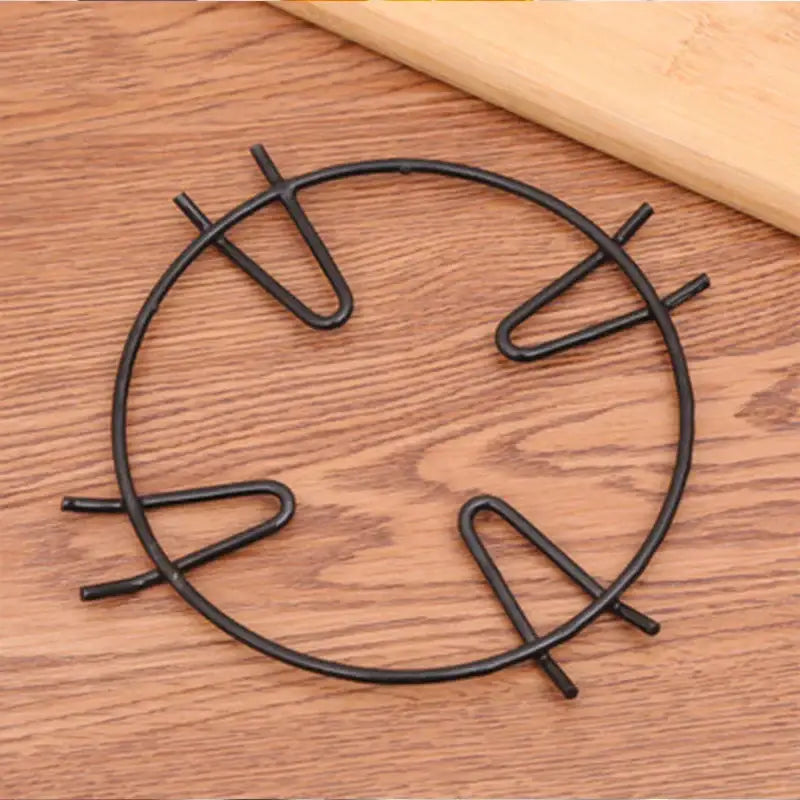 Black metal gas stove pot holder kitchen burner rack