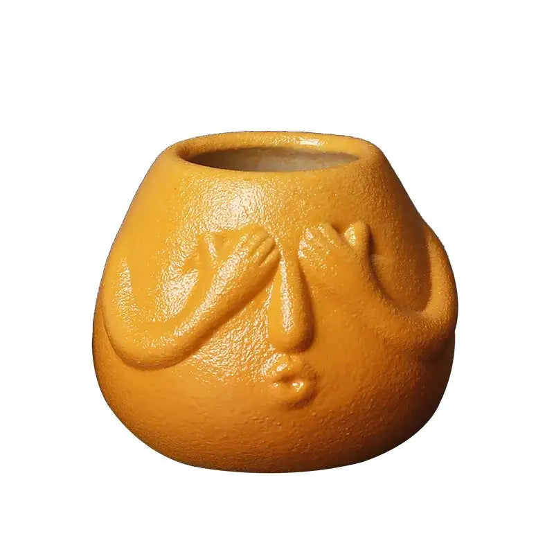 Blue and orange ceramic abstract human face planter living room decor