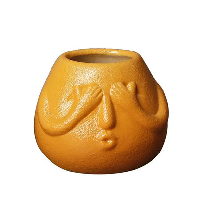 Blue and orange ceramic abstract human face planter living room decor