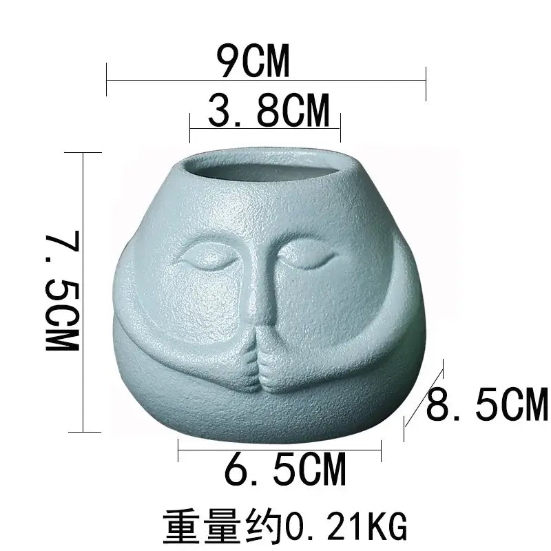 Blue and orange ceramic abstract human face planter living room decor