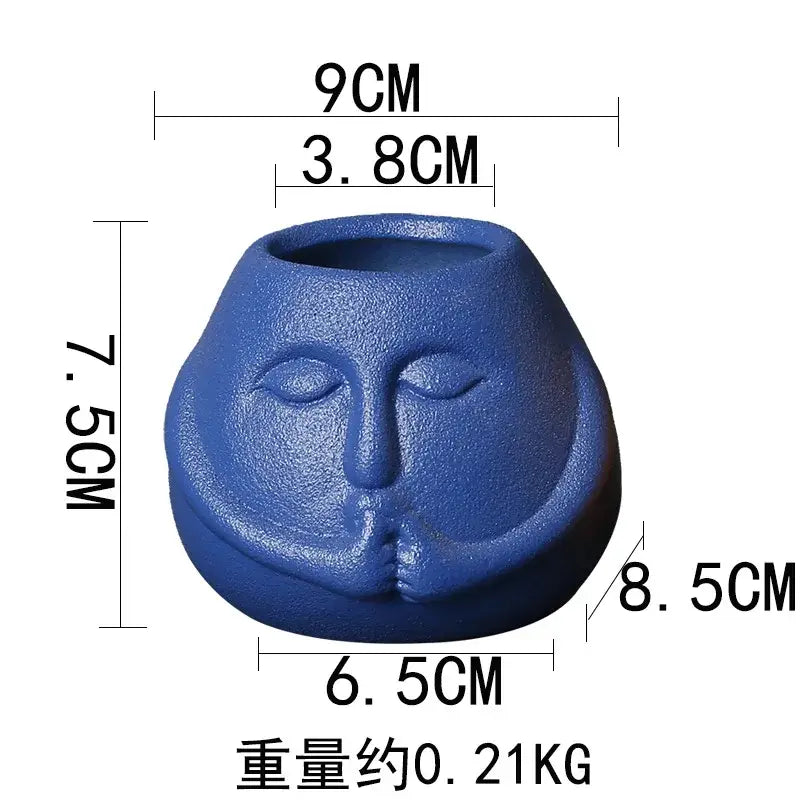 Blue and orange ceramic abstract human face planter living room decor