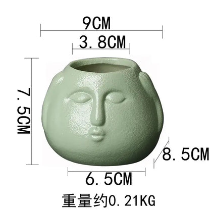 Blue and orange ceramic abstract human face planter living room decor