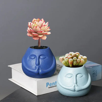 Blue and orange ceramic abstract human face planter living room decor