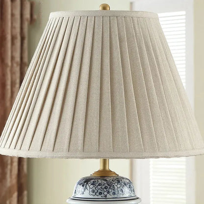Blue and white porcelain table lamp with gold accents for living room