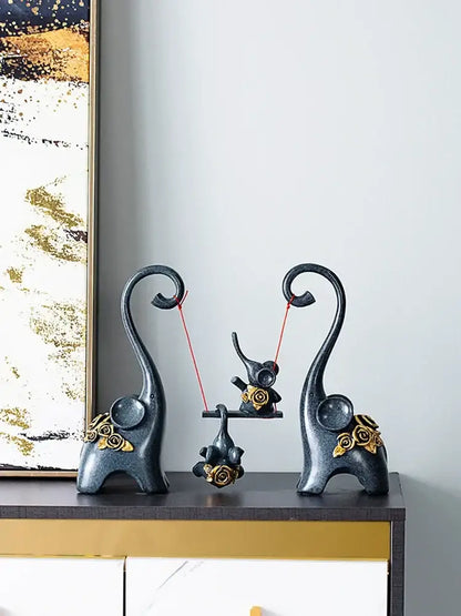 Blue & gold elephant family swing sculpture living room decor