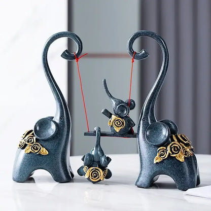 Blue & gold elephant family swing sculpture living room decor