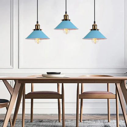 Blue matte metal pendant light with brass fixture for kitchens