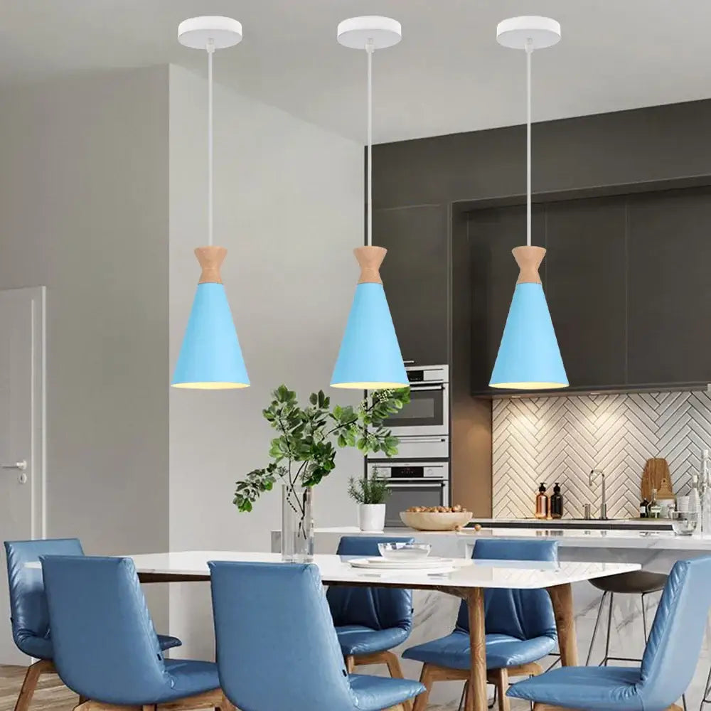 Blue matte metal pendant light with brass fixture for kitchens