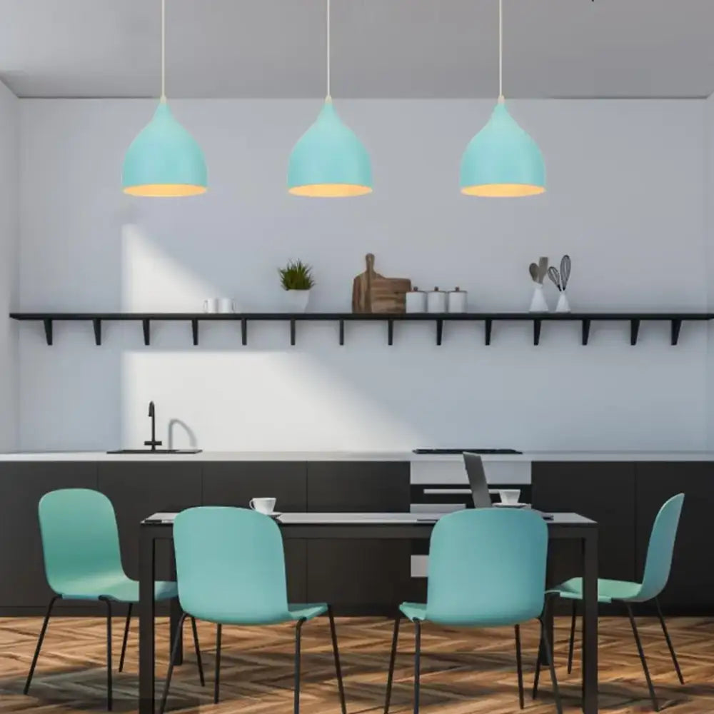 Blue matte metal pendant light with brass fixture for kitchens