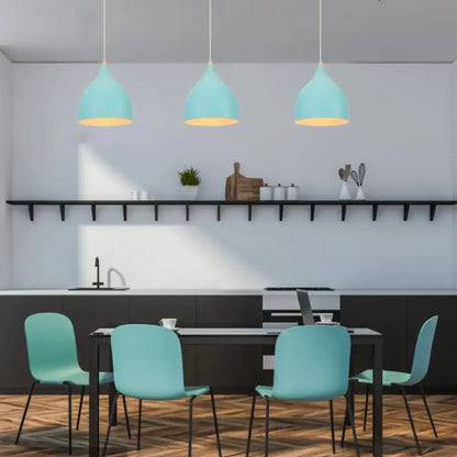 Blue matte metal pendant light with brass fixture for kitchens