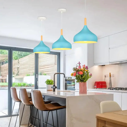 Blue matte metal pendant light with brass fixture for kitchens