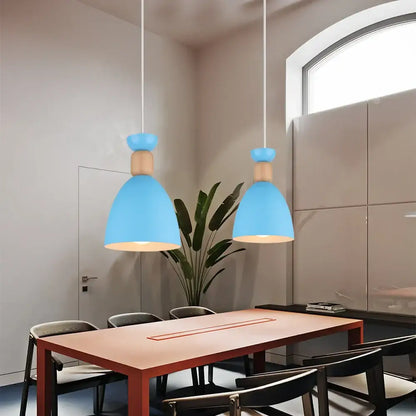 Blue matte metal pendant light with brass fixture for kitchens