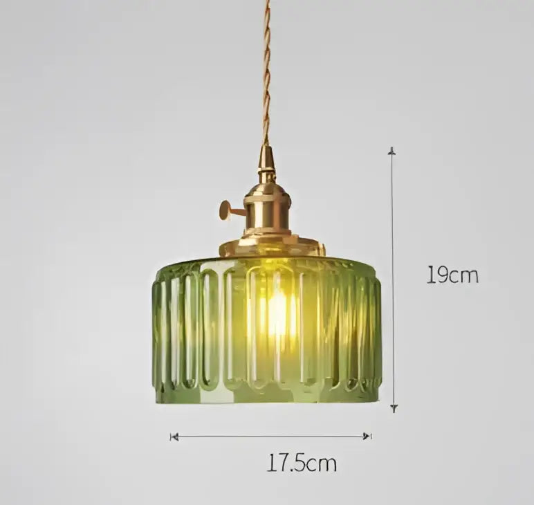 Blue translucent glass pendant lights with brass fixture bedroom