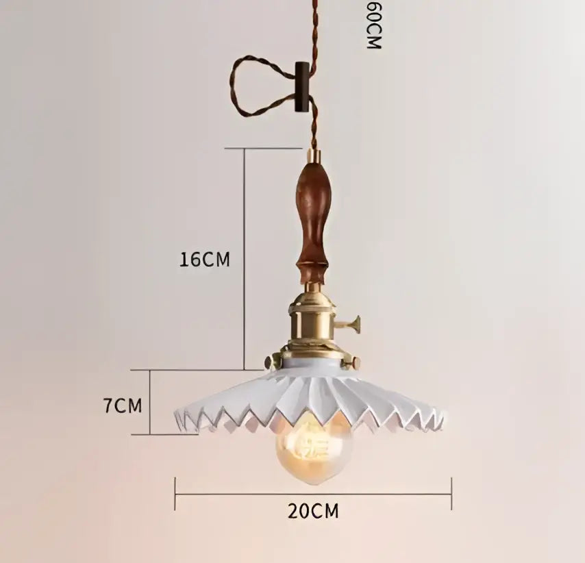 Blue translucent glass pendant lights with brass fixture bedroom