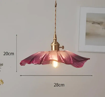 Blue translucent glass pendant lights with brass fixture bedroom