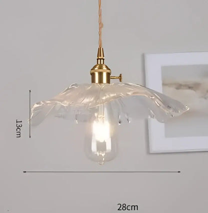 Blue translucent glass pendant lights with brass fixture bedroom