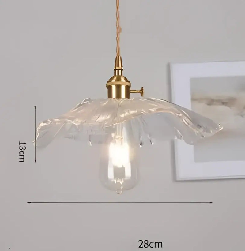 Blue translucent glass pendant lights with brass fixture bedroom