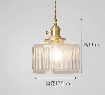 Blue translucent glass pendant lights with brass fixture bedroom