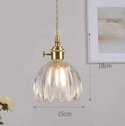 Blue translucent glass pendant lights with brass fixture bedroom