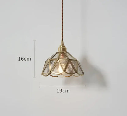Blue translucent glass pendant lights with brass fixture bedroom