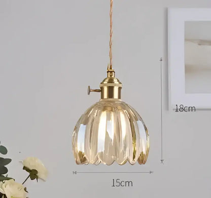 Blue translucent glass pendant lights with brass fixture bedroom