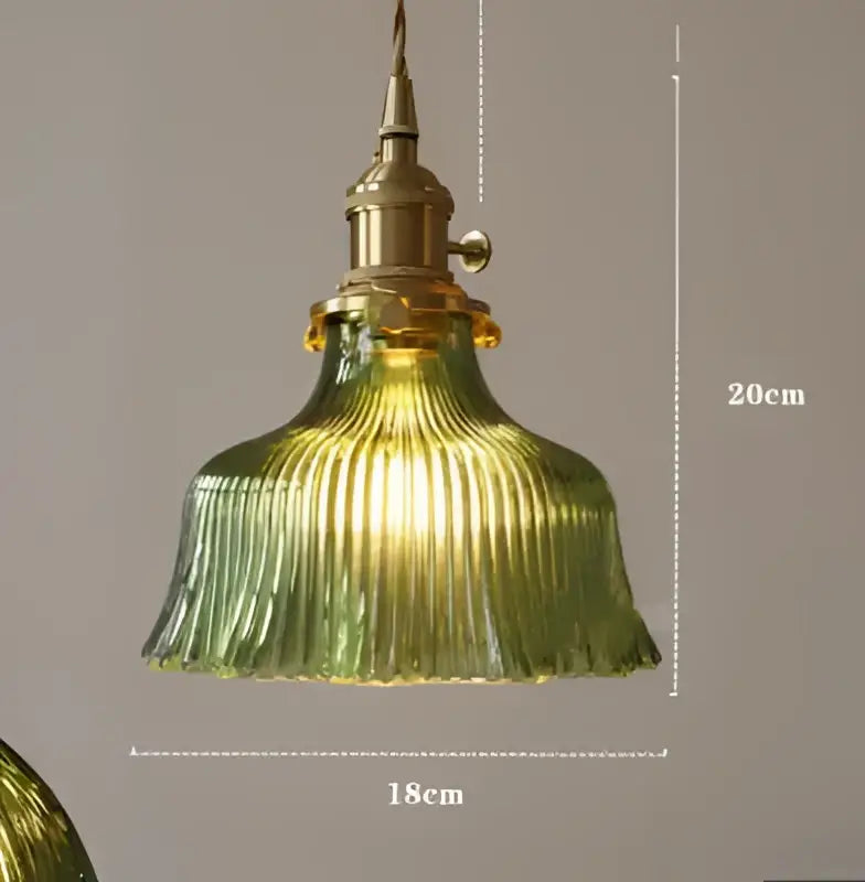 Blue translucent glass pendant lights with brass fixture bedroom