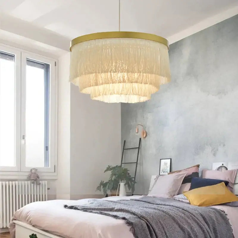 Bohemian gold tiered chandelier gray & golden fringe bedroom light