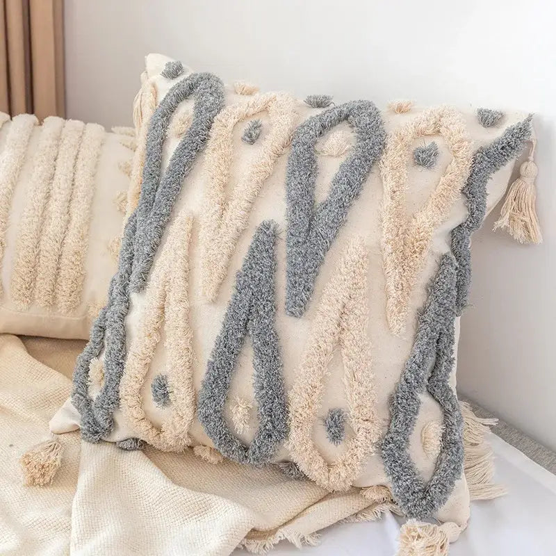 Boho square pillowcase with white zigzag and teal tassels living room