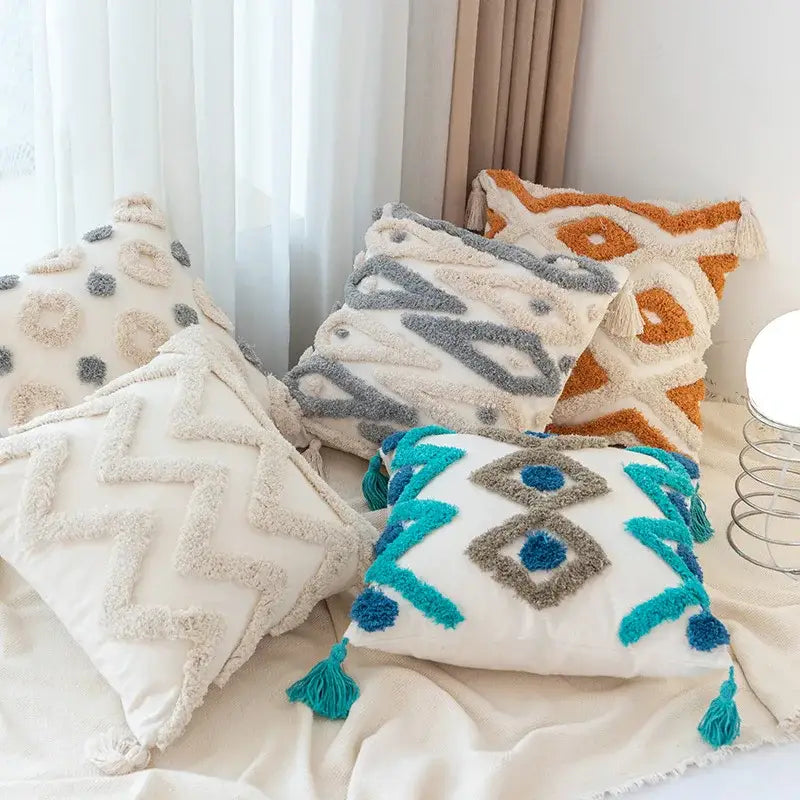 Boho square pillowcase with white zigzag and teal tassels living room