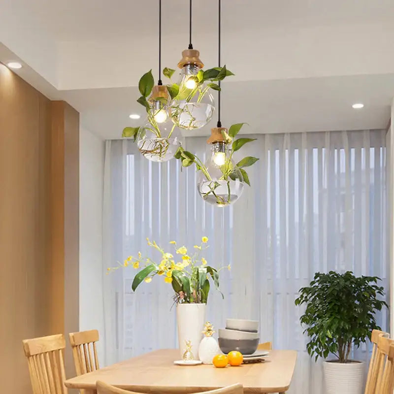 Botanical glass bottle pendant light kitchen clear wood accents