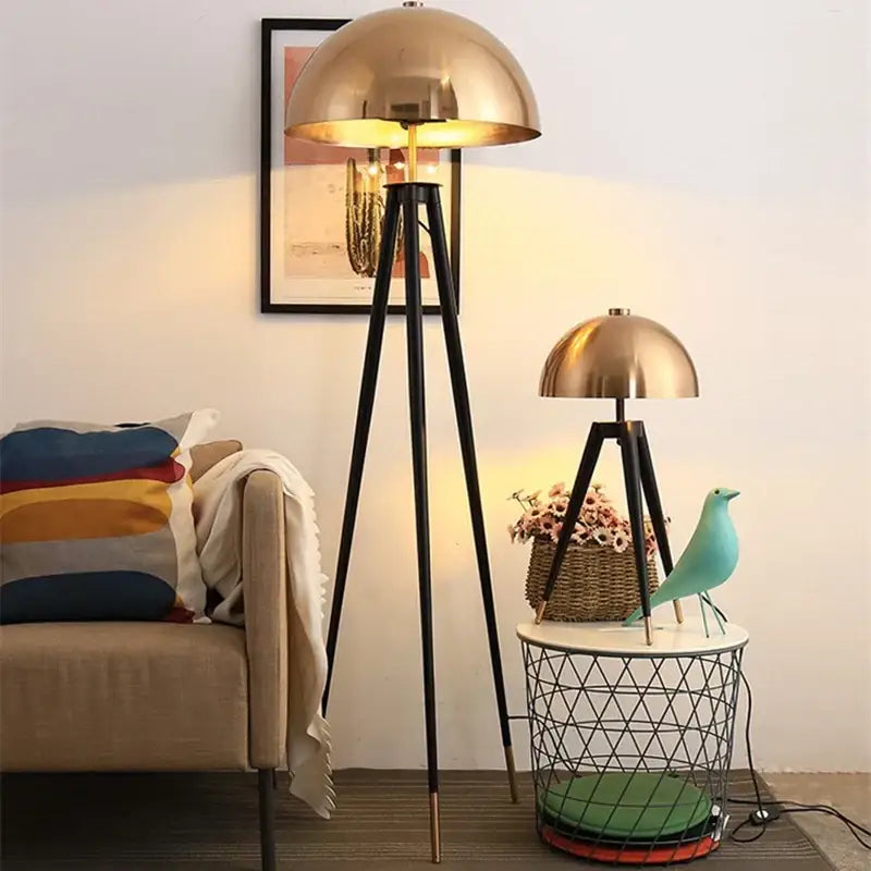 Brass and black coyote gold tripod floor lamp for living room