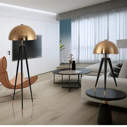Brass and black coyote gold tripod floor lamp for living room